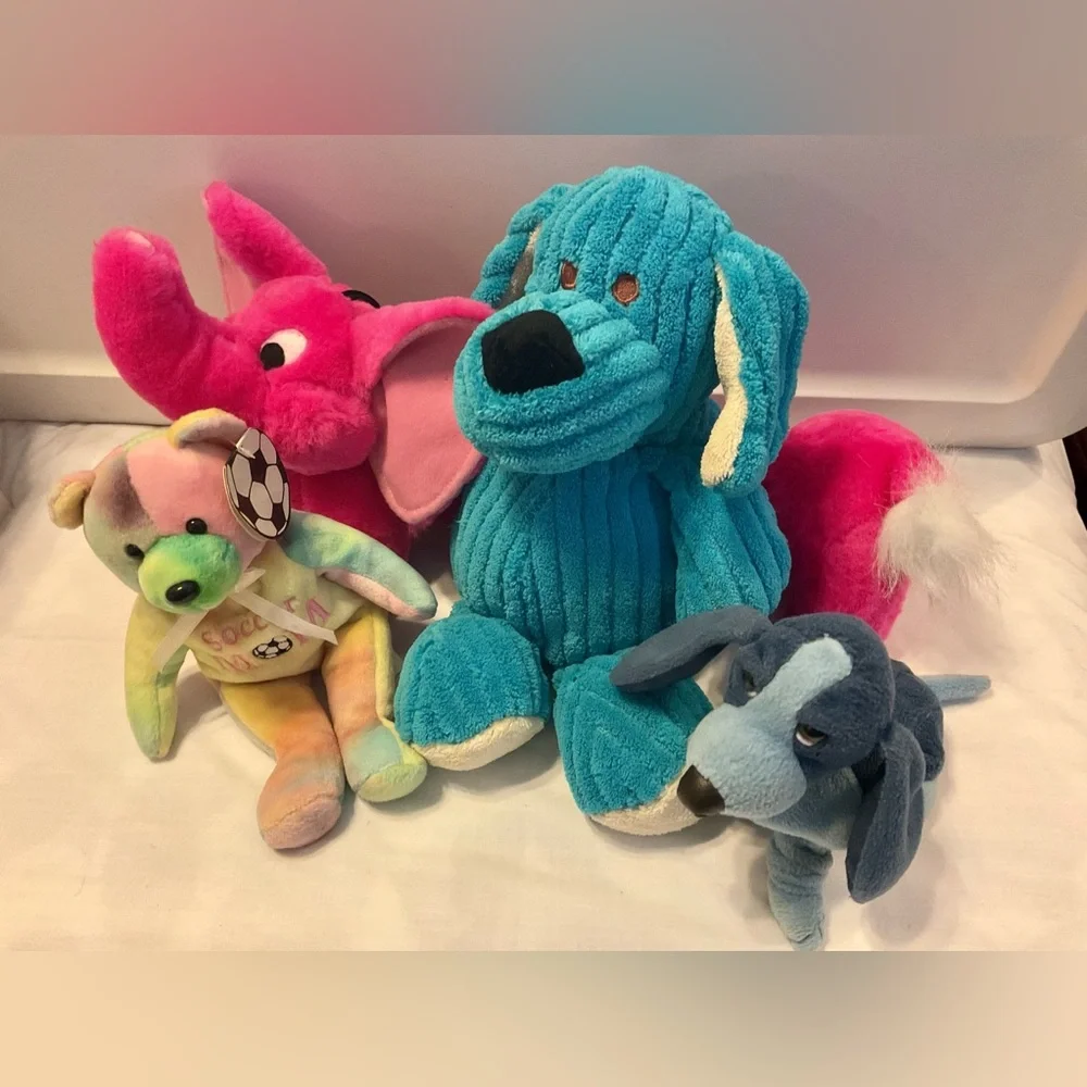 4 stuffed animals: blue dogs, hot pink elephant dog & soccer mom multicolor bear